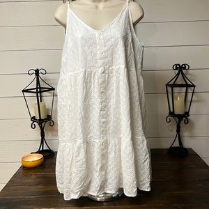 White eyelet tunic length top.